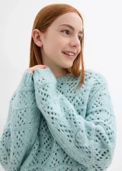 Pull en grosse maille à broderie ajourée