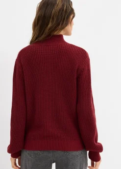 Pull en grosse maille avec découpes