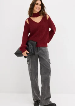 Pull en grosse maille avec découpes