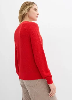 Pull en grosse maille avec patte de boutonnage