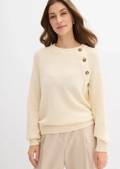 Pull en grosse maille avec patte de boutonnage