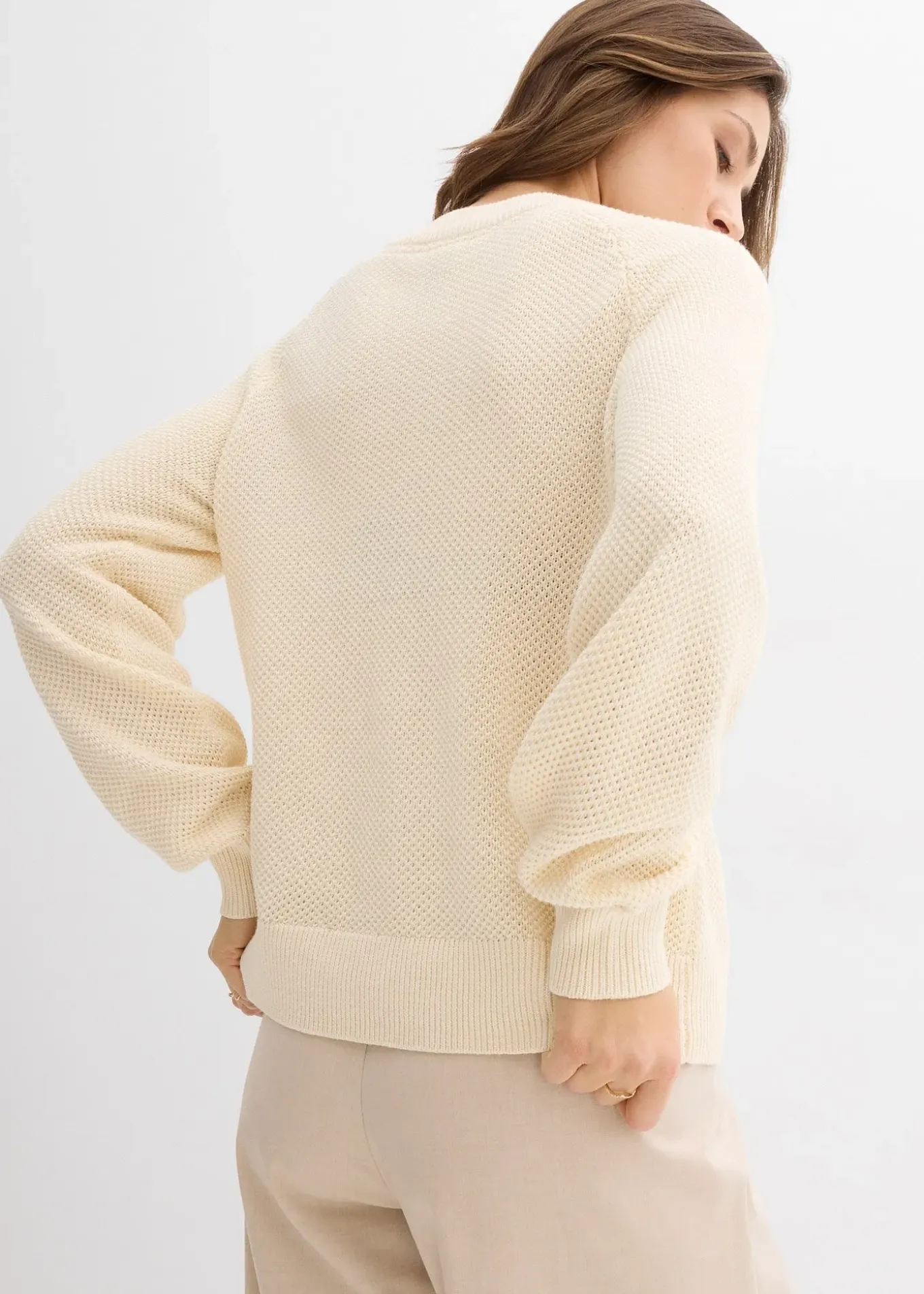 Pull en grosse maille avec patte de boutonnage