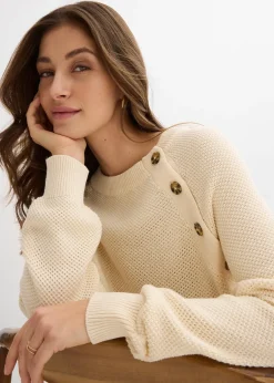 Pull en grosse maille avec patte de boutonnage