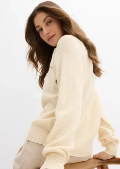 Pull en grosse maille avec patte de boutonnage