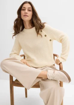 Pull en grosse maille avec patte de boutonnage