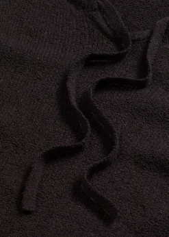 Pull en grosse maille avec lien à nouer