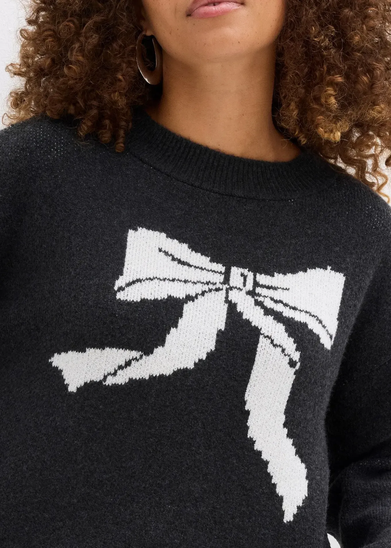 Pull en maille avec nœud