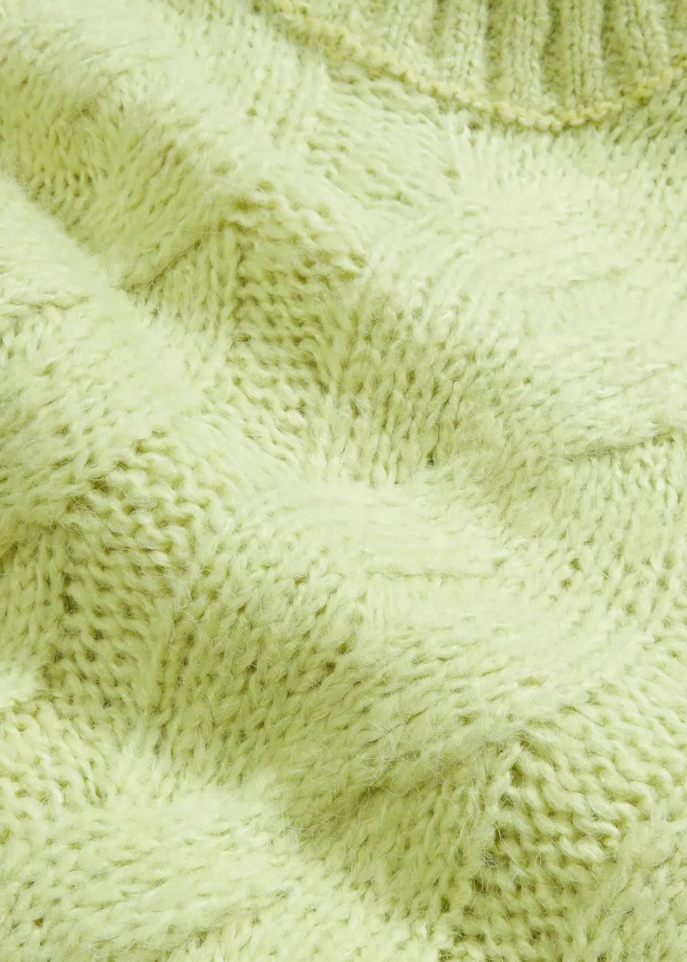 Pull en maille torsadée