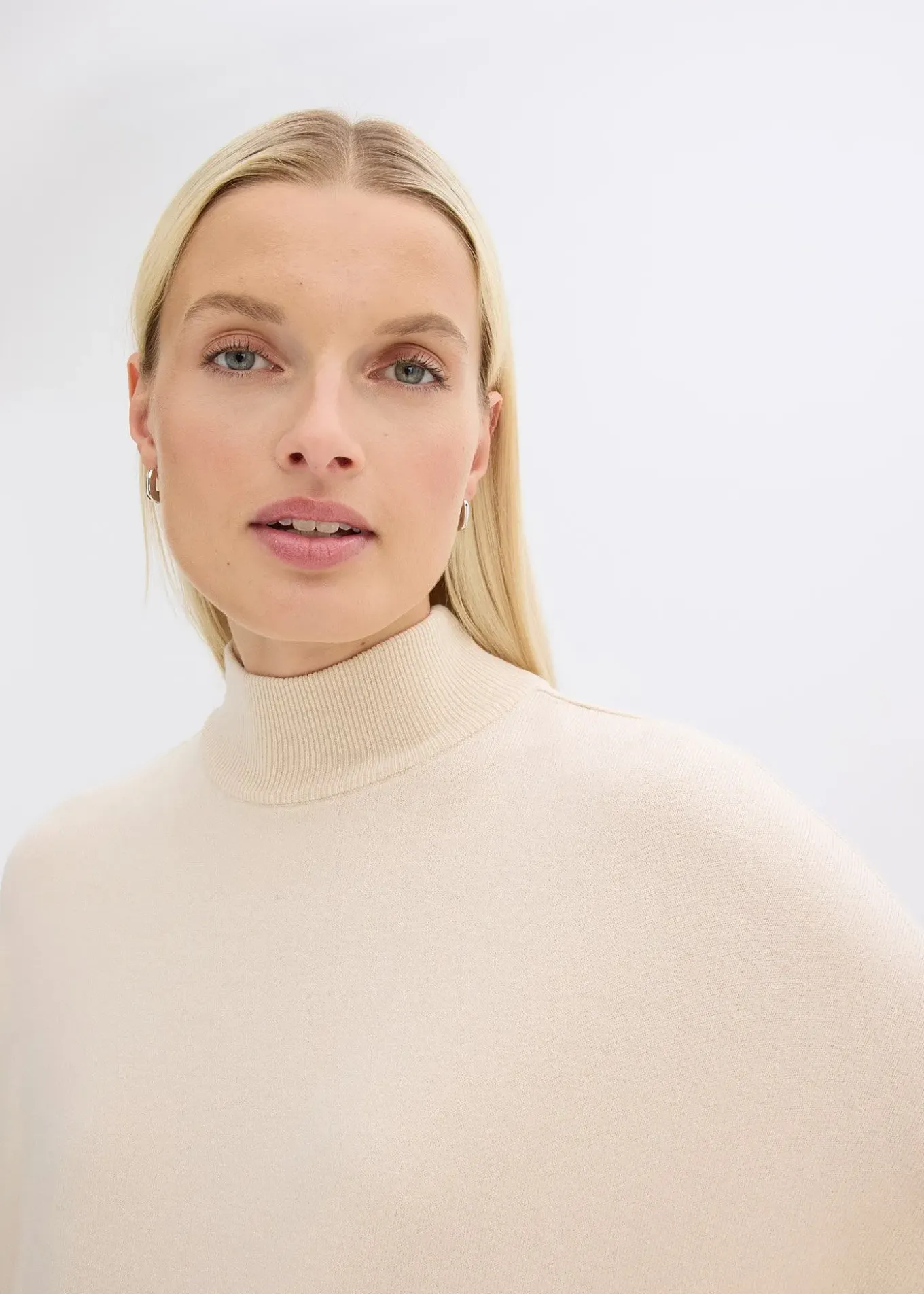 Pull forme cape en viscose mélangée