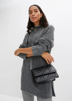 Pull long en maille torsadée