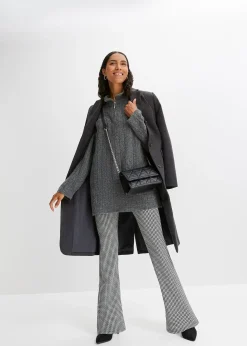 Pull long en maille torsadée