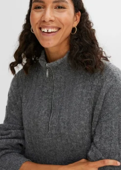 Pull long en maille torsadée