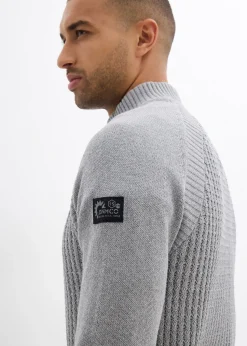 Pull texturé à col montant