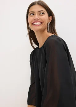 Robe courte en dentelle avec drapé en mousseline