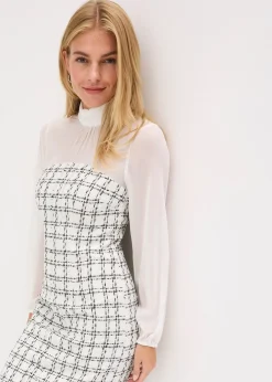 Robe courte en maille bouclette avec manches en mousseline