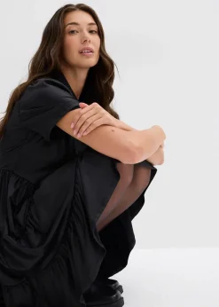 Robe courte en matière brillante