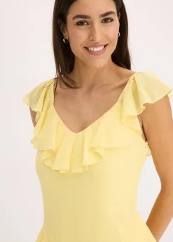 Robe en crêpe avec bretelles et volants