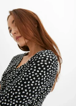 Robe en jersey imprimé avec drapé