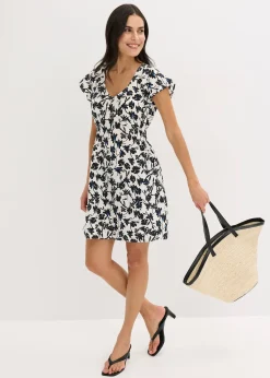 Robe en tissu texturé avec manches papillon