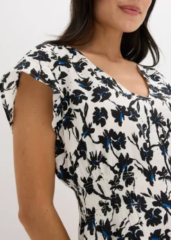 Robe en tissu texturé avec manches papillon