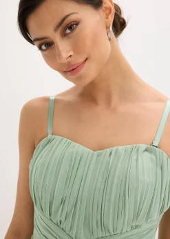 Robe longue en mesh, avec plusieurs façons de la porter