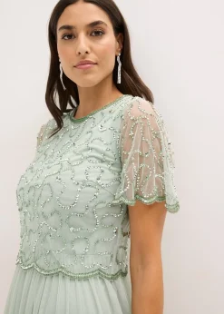 Robe longue en tulle fin avec sequins brodés