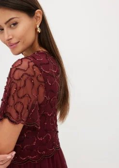 Robe longue en tulle fin avec sequins brodés