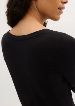 Robes en jersey à col V