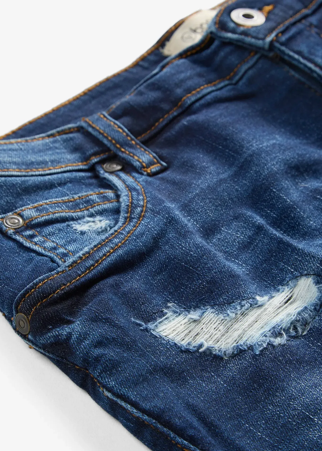 Short en jean taille mi-haute à effets déchirés