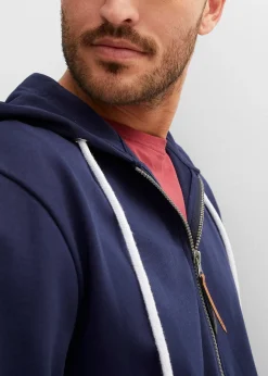 Sweat zippé à capuche et détails enduits