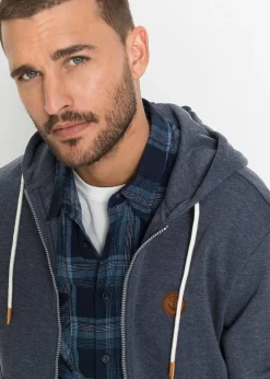 Sweat zippé à capuche et détails enduits