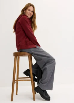 Sweat zippé à capuche et poches en maille