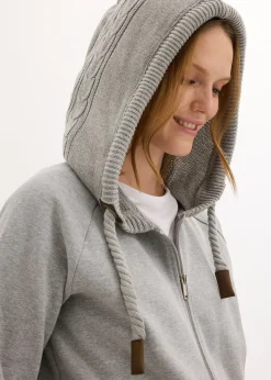 Sweat zippé à capuche et poches en maille