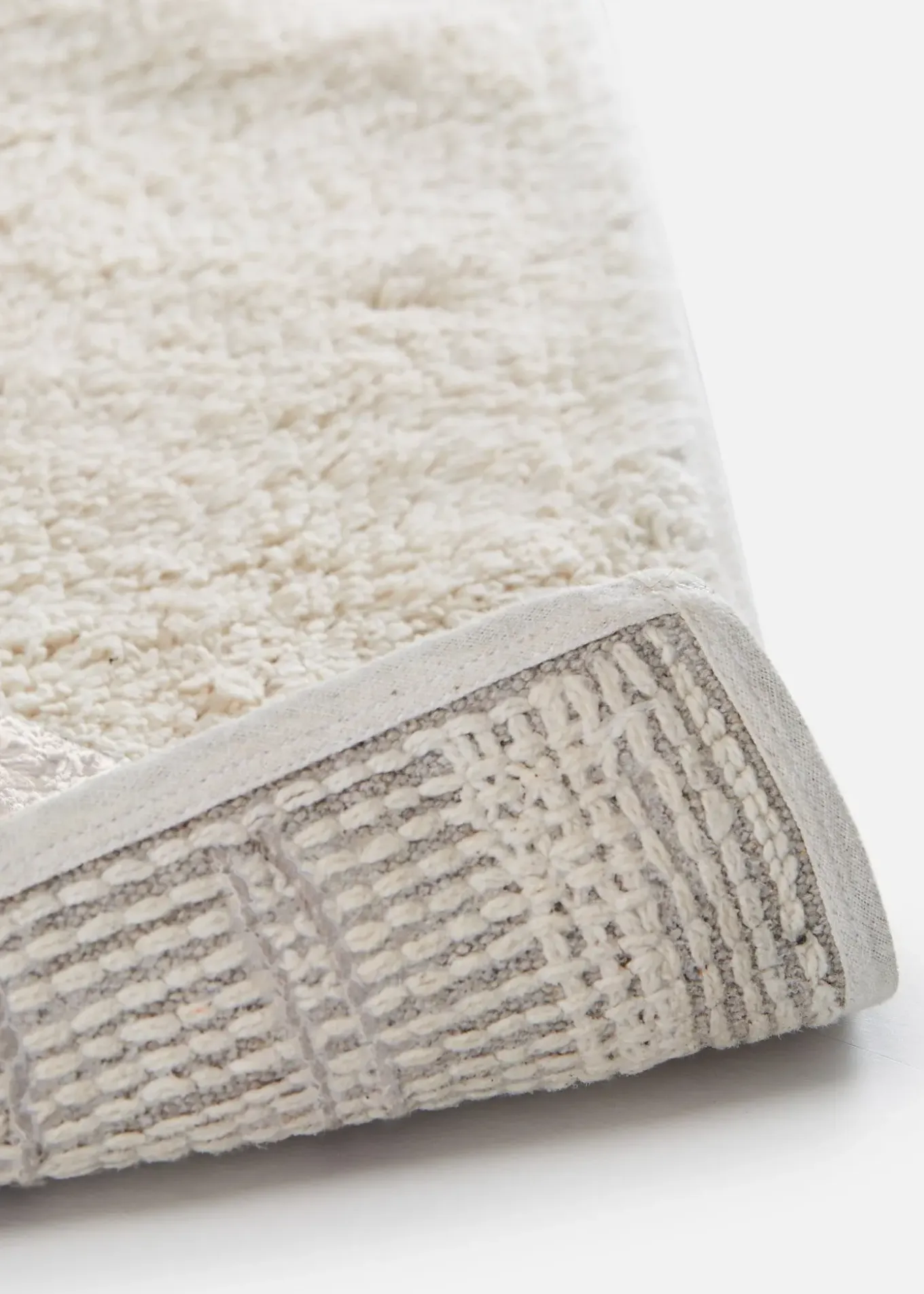 Tapis de bain à motif graphique