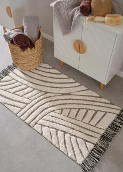 Tapis de bain à motif graphique