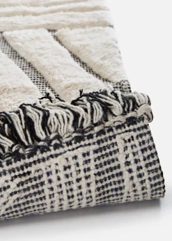 Tapis de bain à motif graphique