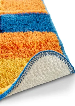 Tapis de bain aux couleurs vives