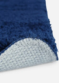 Tapis de bain tufté uni et haut
