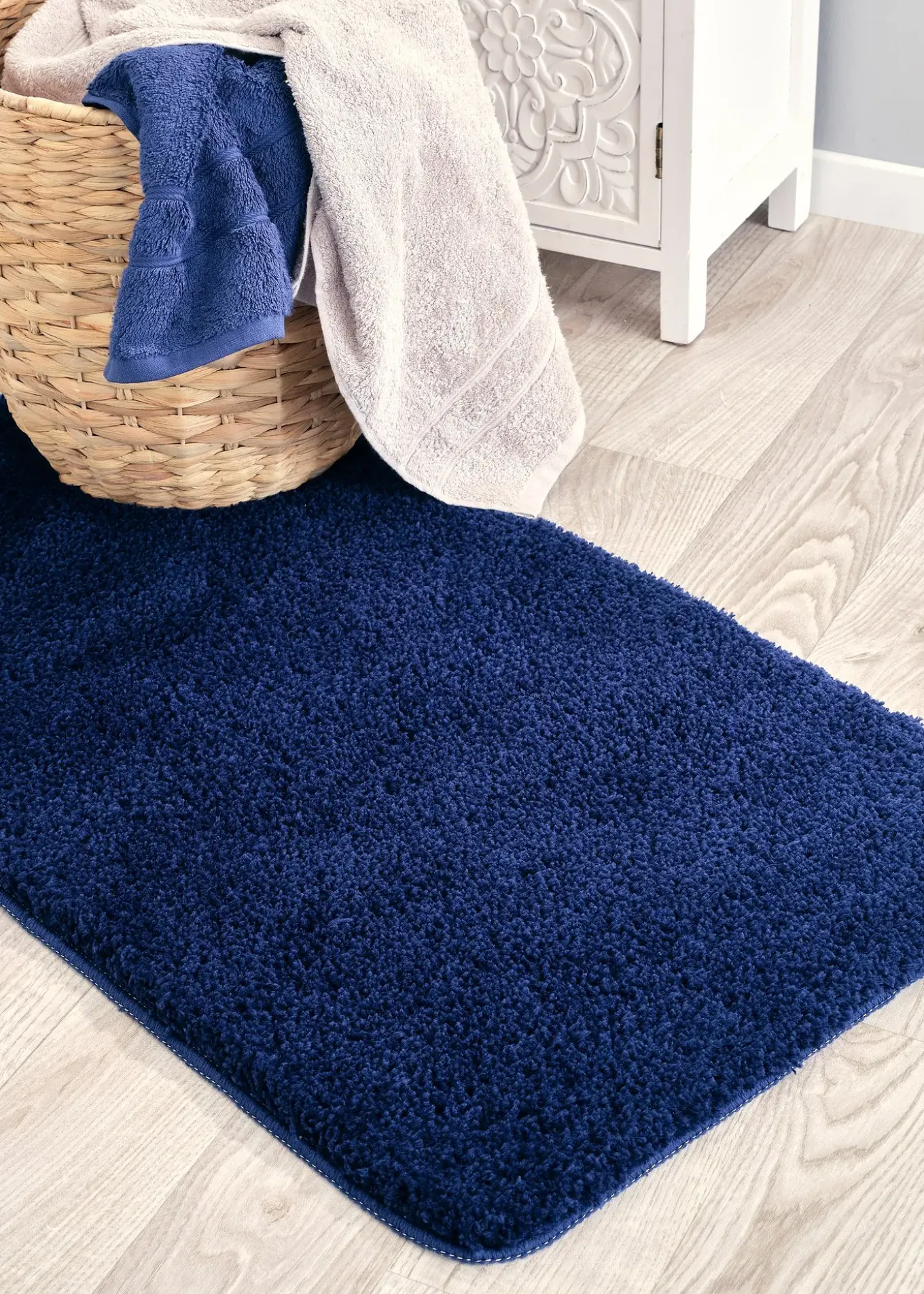 Tapis de bain tufté uni et haut
