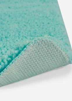 Tapis de bain tufté uni et haut