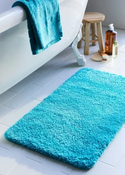 Tapis de bain tufté uni et haut