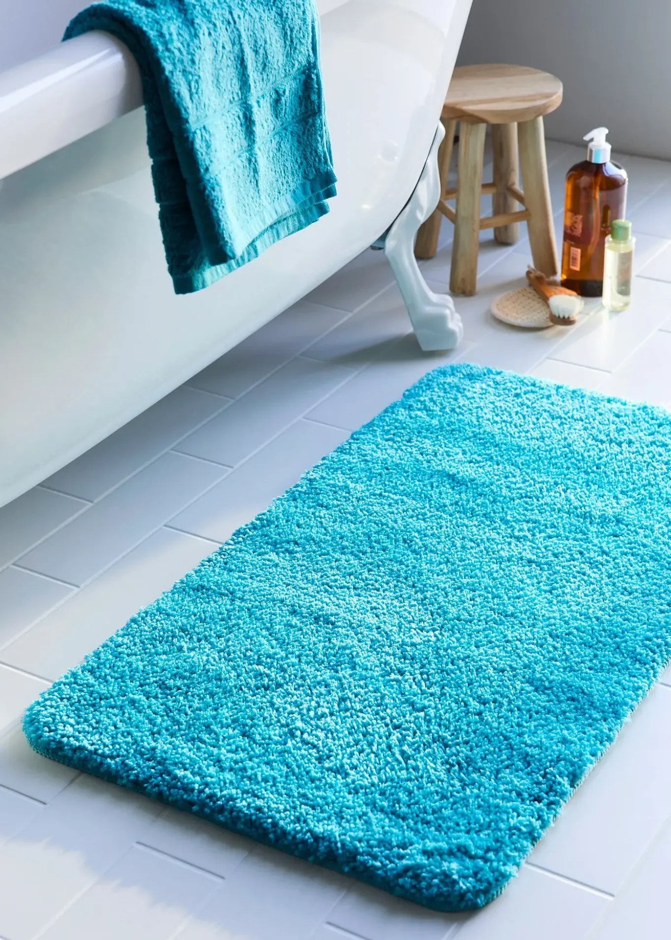 Tapis de bain tufté uni et haut
