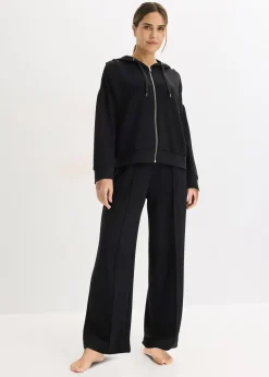 Tenue d’intérieur en matière néoprène avec veste raccourcie