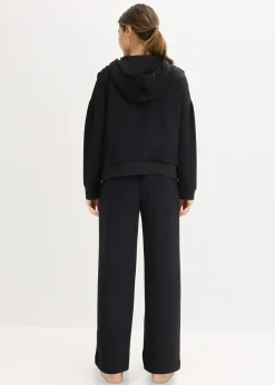 Tenue d’intérieur en matière néoprène avec veste raccourcie