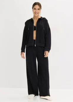 Tenue d’intérieur en matière néoprène avec veste raccourcie