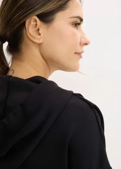 Tenue d’intérieur en matière néoprène avec veste raccourcie