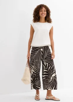 Top à base élastiquée