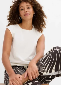 Top à base élastiquée