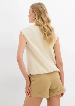 Top à base élastiquée