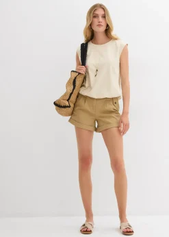 Top à base élastiquée